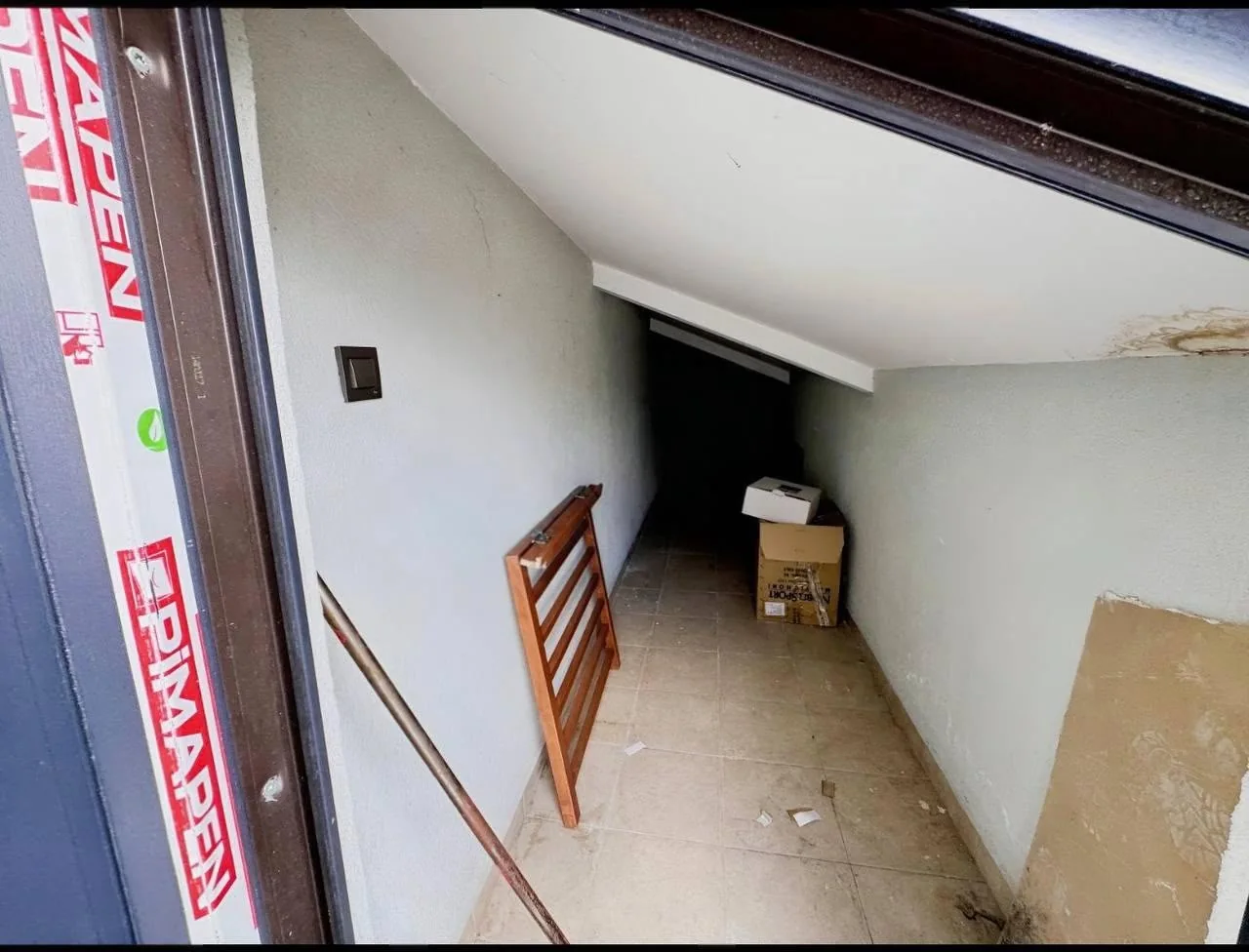 Attic space shown with unfinished finishing work