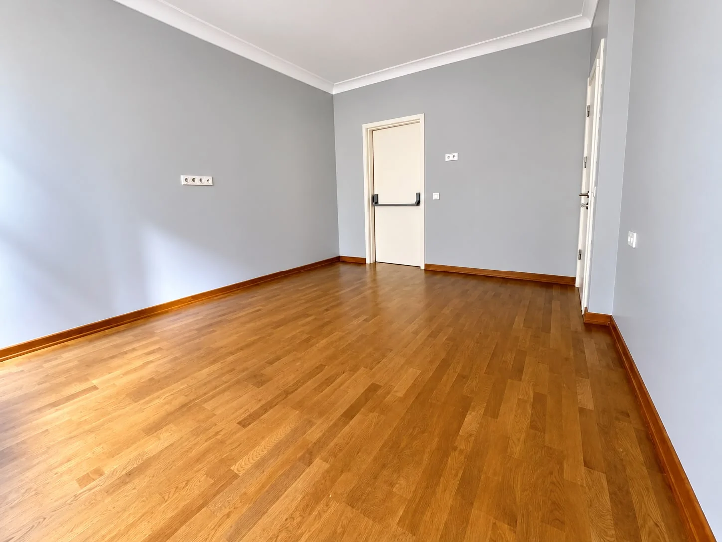 Bedroom with parquet flooring